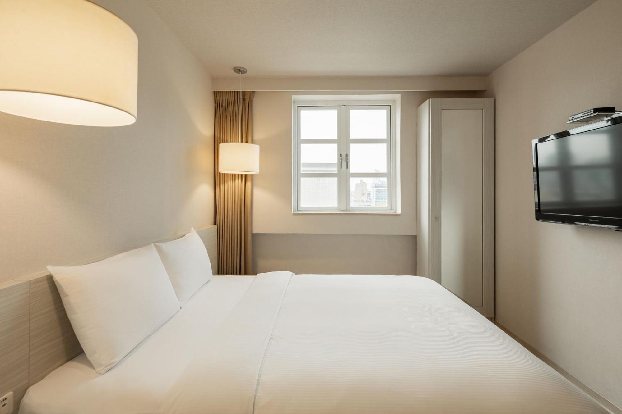 Kindness Hotel - Houyi Jiuru Cao Hùng Phòng bức ảnh